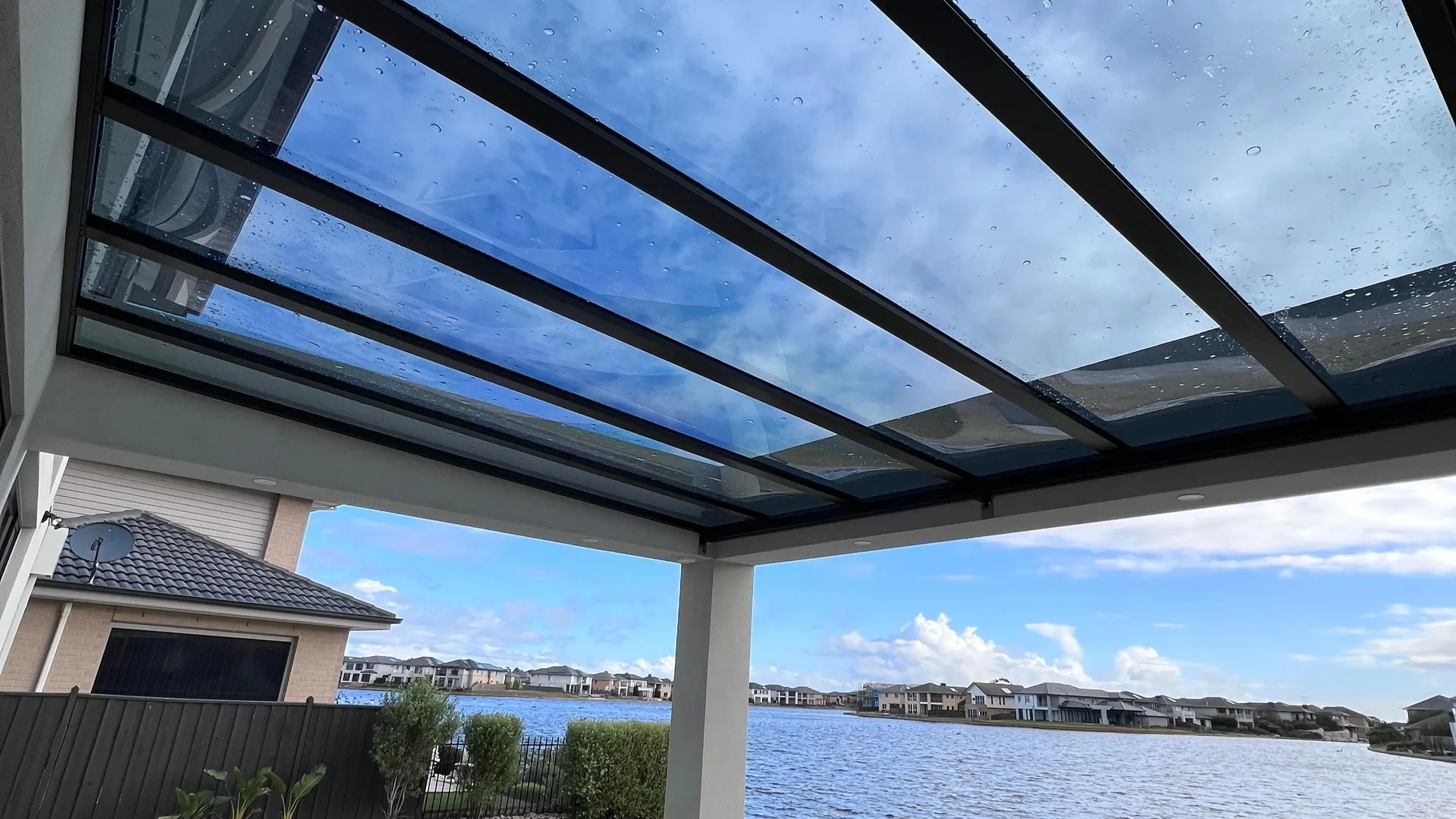 Clearview transparent patio roof retaining daylight beside a Melbourne home