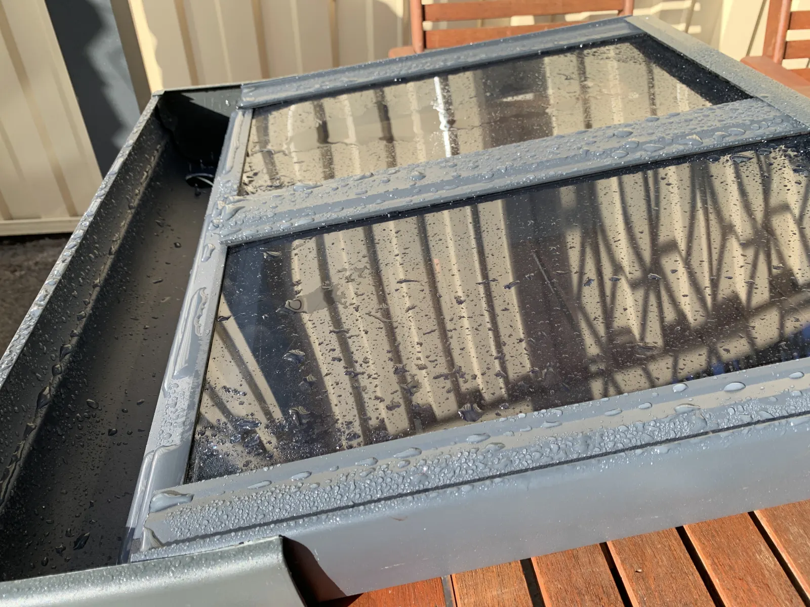 Clearview demonstration frame showing the gutter channel integrated into the front aluminium edge
