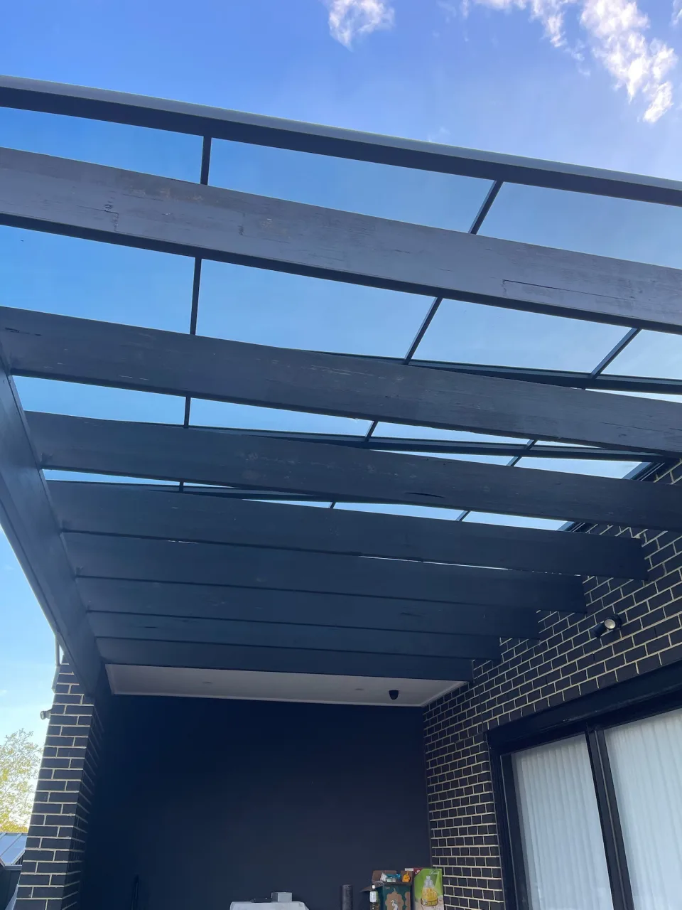 Close view of the completed Clearview roof edge above the pergola